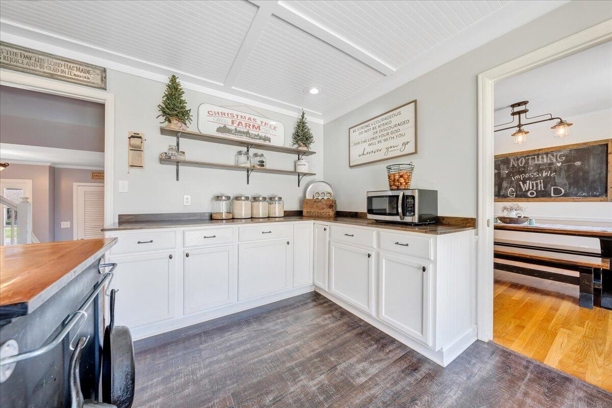 123 Bartley Drive Salem, VA 24153 - Photo 11 of 57 a kitchen with cabinets stainless steel appliances and a window