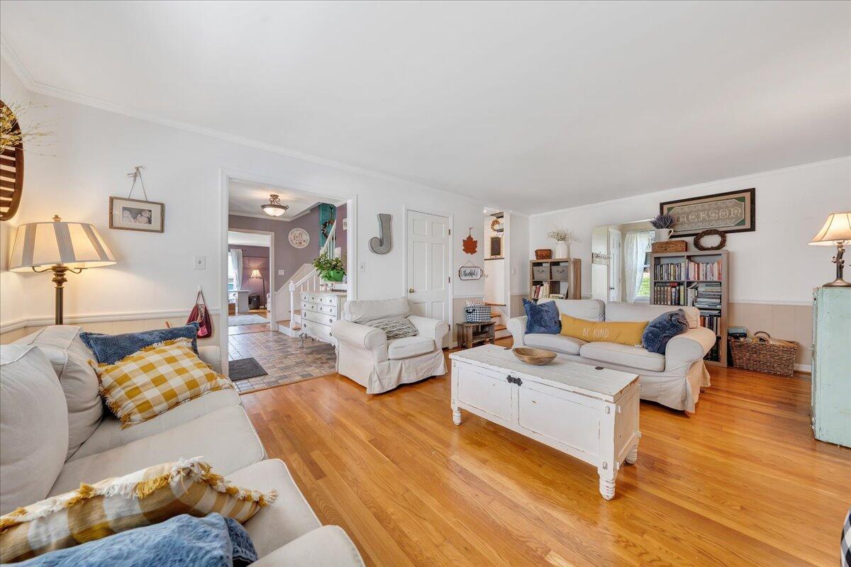 123 Bartley Drive Salem, VA 24153 - Photo 22 of 57 a living room with furniture and a wooden floor