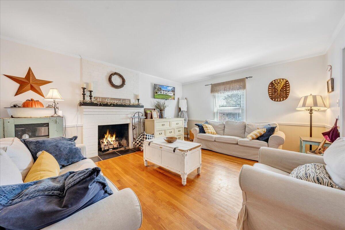 123 Bartley Drive Salem, VA 24153 - Photo 23 of 57 a living room with furniture and a fireplace