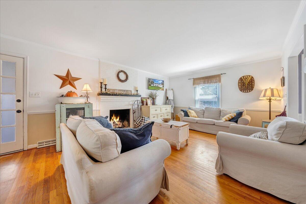 123 Bartley Drive Salem, VA 24153 - Photo 26 of 57 a living room with furniture and a fireplace