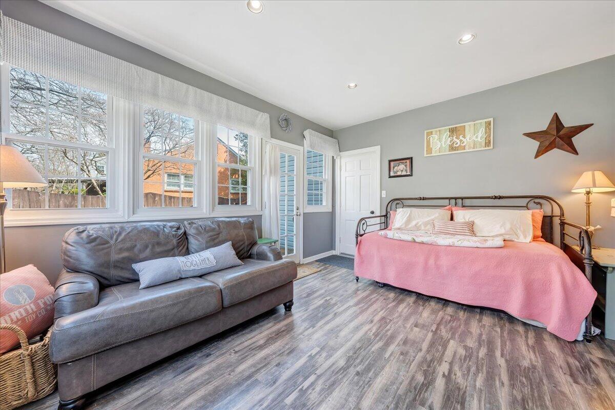 123 Bartley Drive Salem, VA 24153 - Photo 29 of 57 a spacious bedroom with a bed couch and a window
