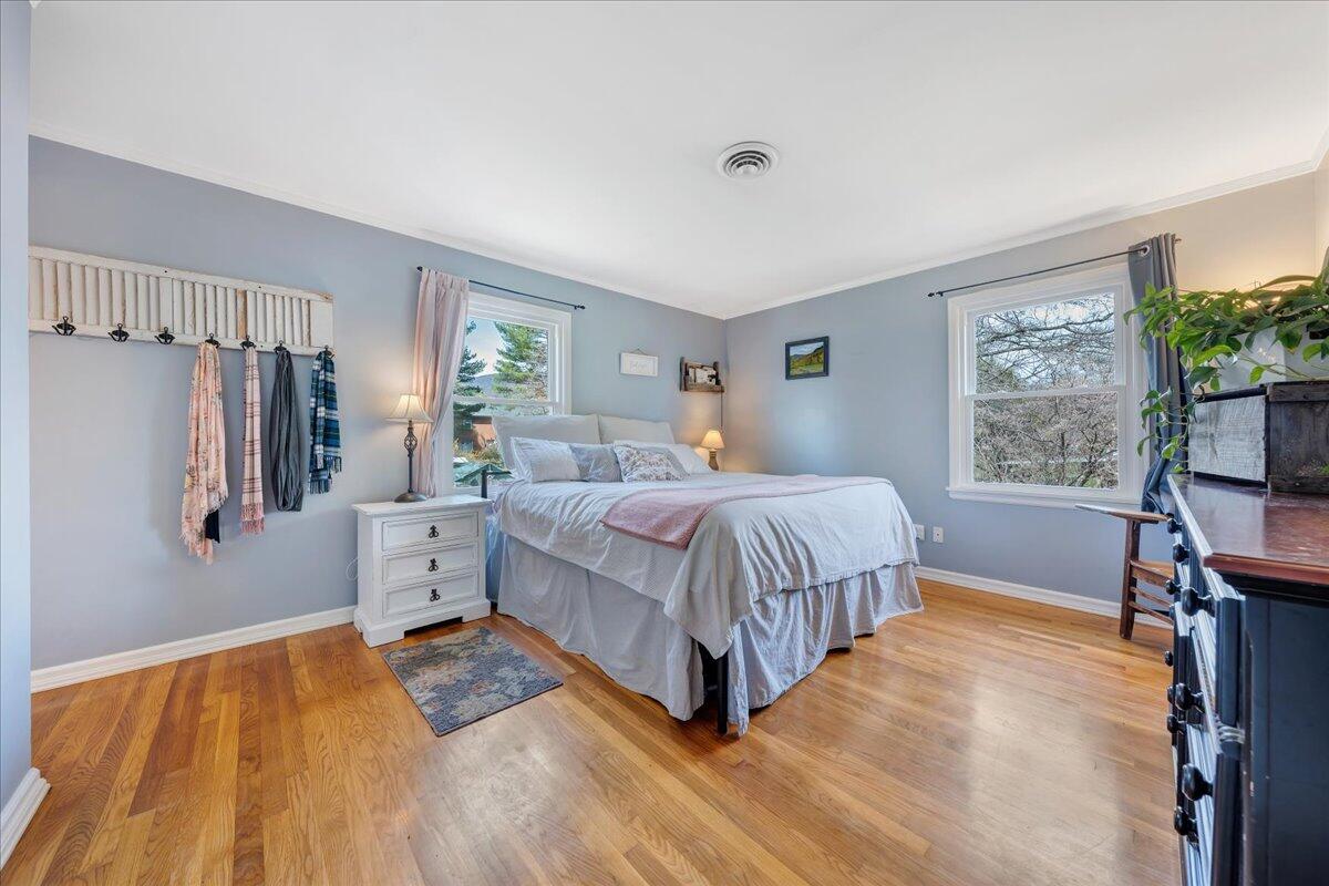 123 Bartley Drive Salem, VA 24153 - Photo 34 of 57 a bedroom with a bed couch tv and a window