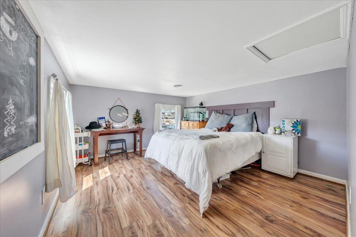 123 Bartley Drive Salem, VA 24153 - Photo 40 of 57 a bedroom with a bed and a table in it