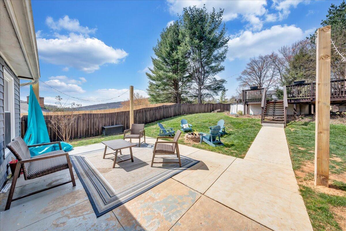 123 Bartley Drive Salem, VA 24153 - Photo 44 of 57 a view of a patio with couches and a fire pit