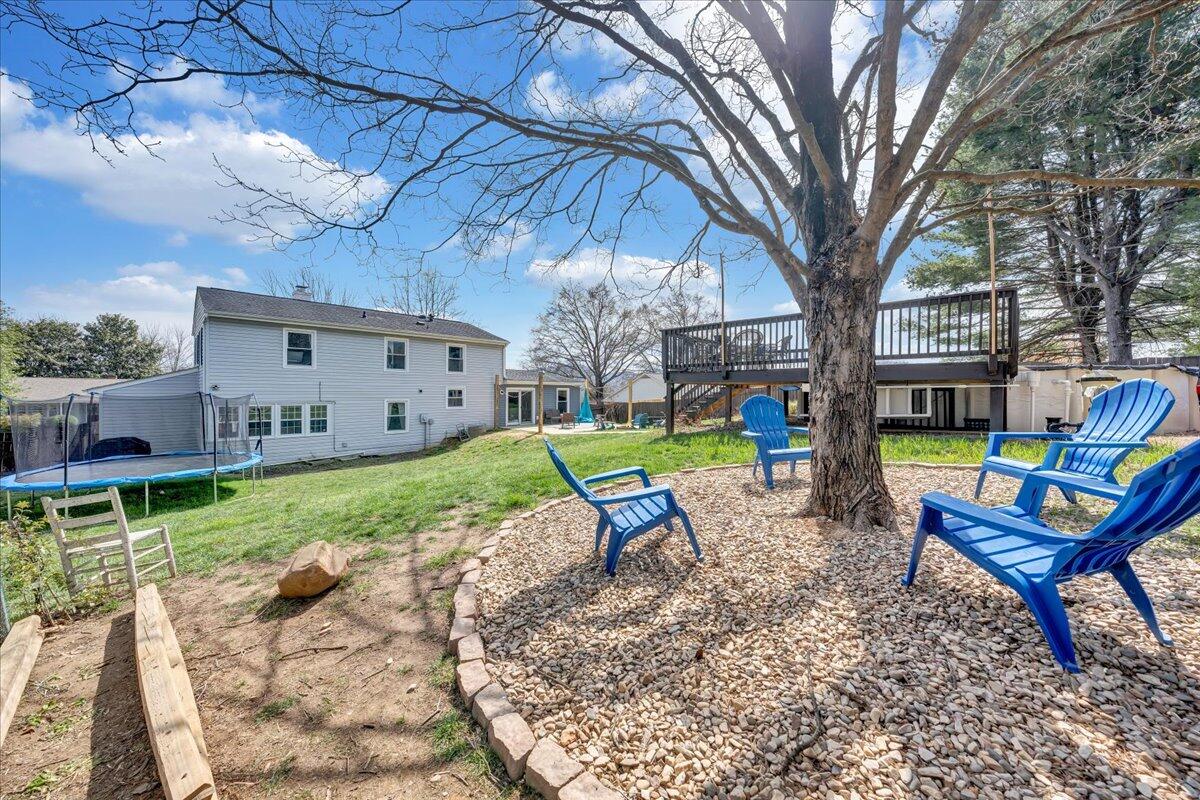 123 Bartley Drive Salem, VA 24153 - Photo 46 of 57 a view of a chair and table in the backyard
