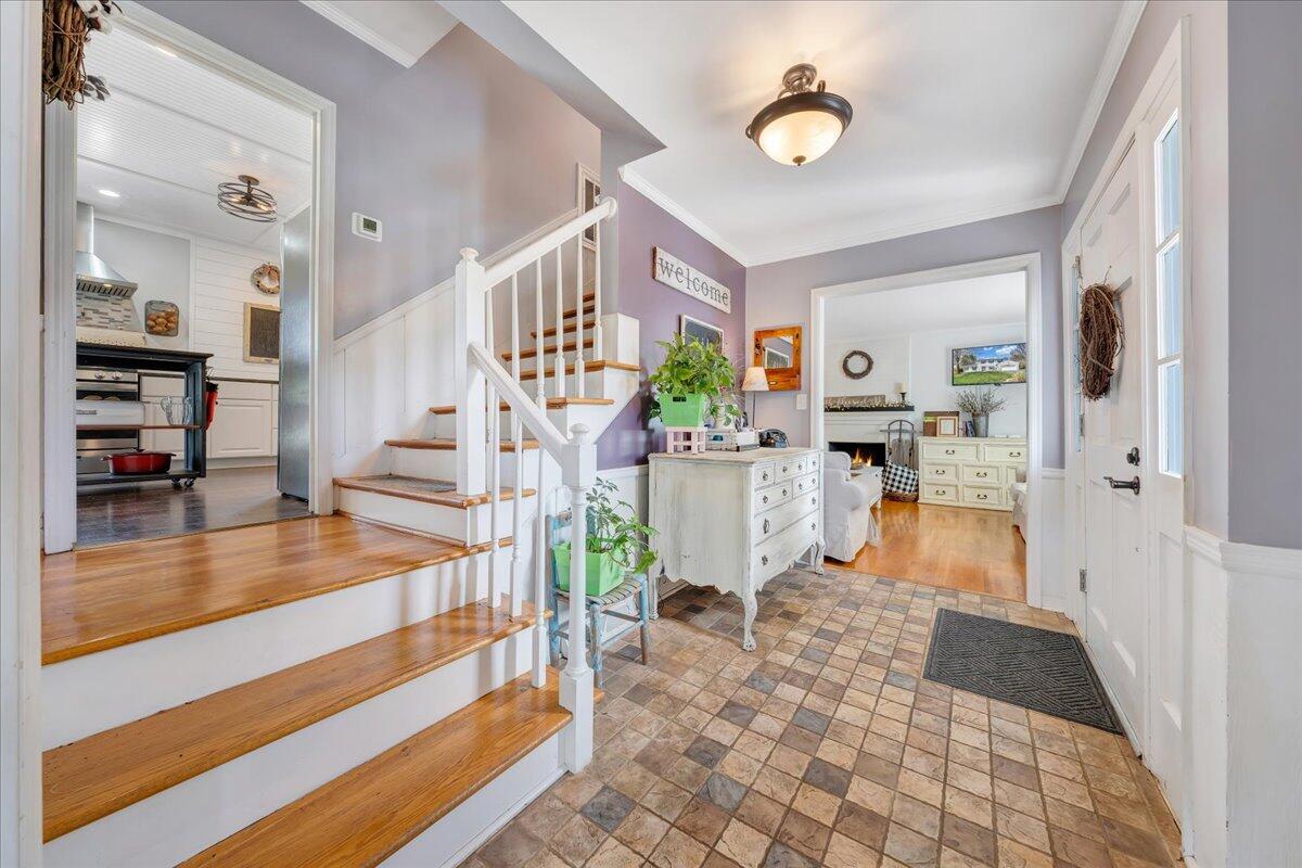 123 Bartley Drive Salem, VA 24153 - Photo 6 of 57 a living room with furniture and a view of kitchen