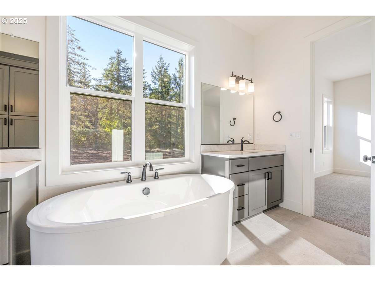 7168 Southeast Eola Hills Road Amity, OR 97101 - Photo 26 of 34 a bathroom with a sink and a bathtub