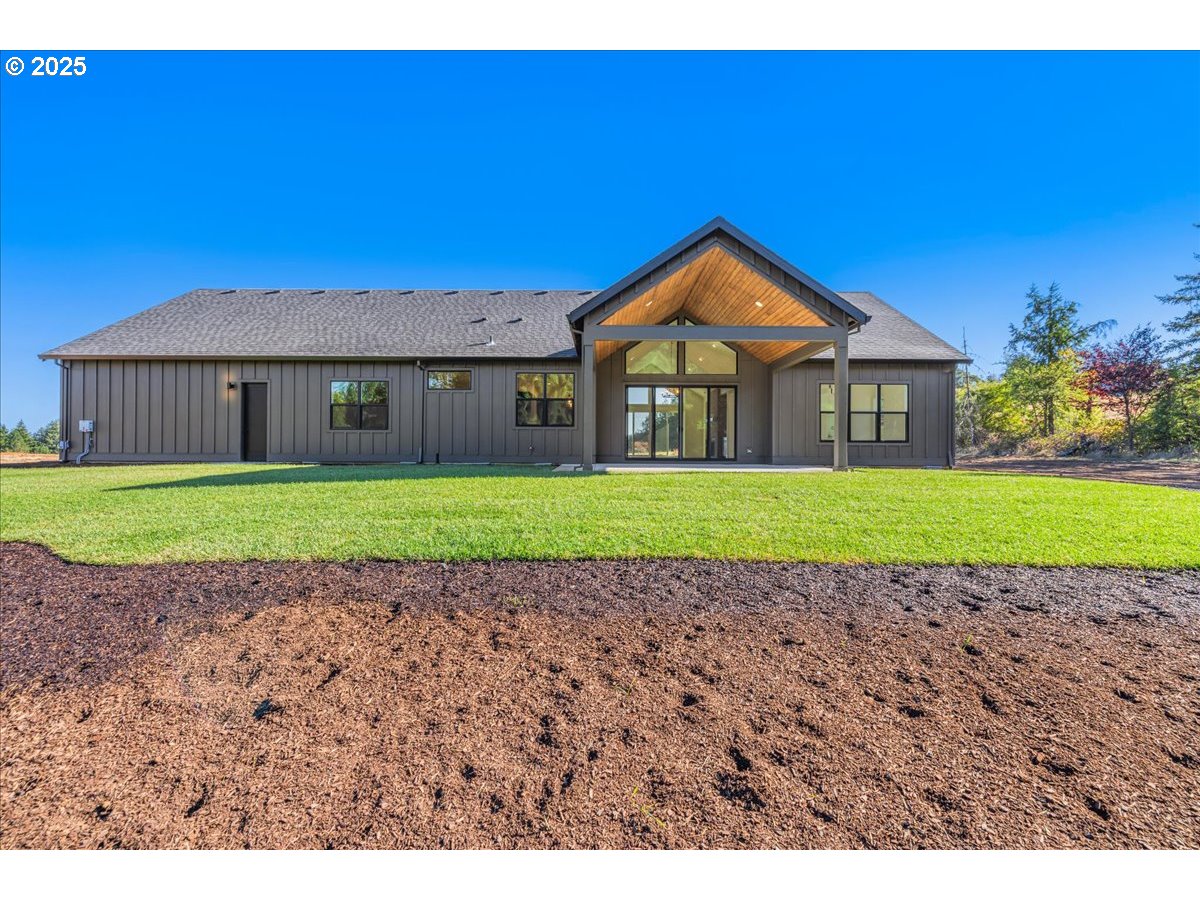 7168 Southeast Eola Hills Road Amity, OR 97101 - Photo 32 of 34 a view of a house with a yard