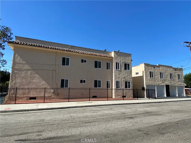 a view of a building with a street