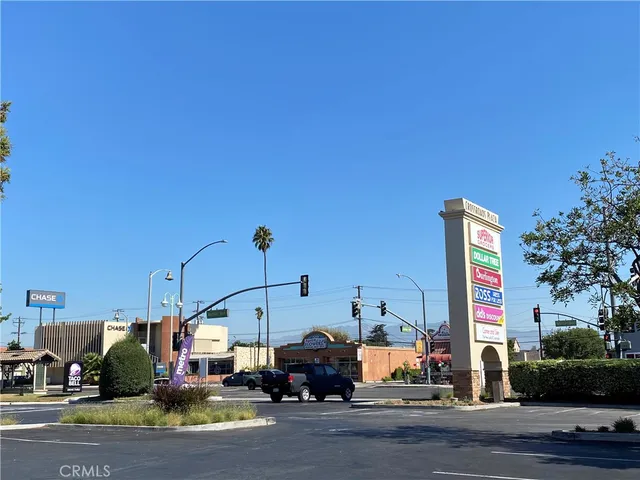 a street view with tall buildings
