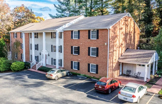 a car parked in front of a house