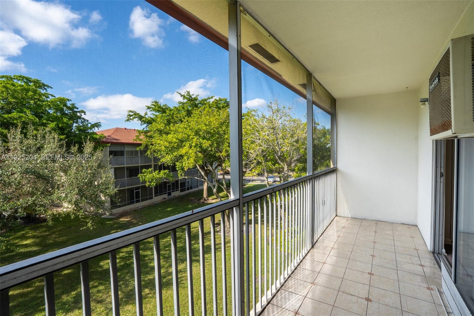 100 Southwest 132nd Way, Unit 306K Pembroke Pines, FL 33027 - Photo 17 of 31 a view of a balcony with flower plants
