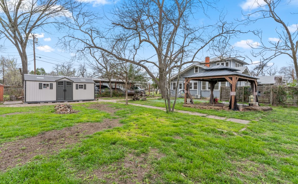 501 East 6th Street Cameron, TX 76520 - Photo 8 of 39 View of yard featuring a gazebo, an outdoor structure, and a shed