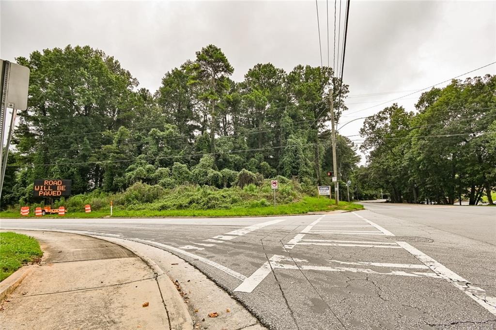 2827 Henderson Mill Road Atlanta, GA 30341 - Photo 15 of 17 a view of a road with a yard