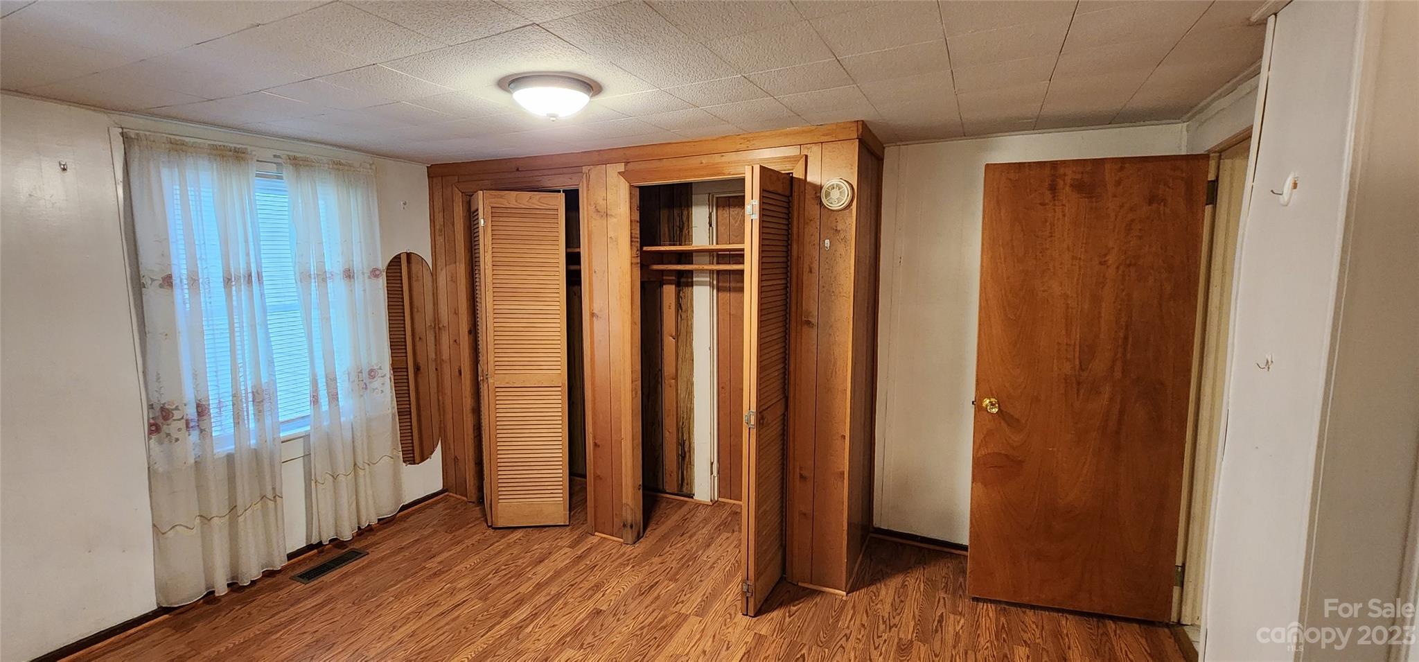 19 Rector Street Tryon, NC 28782 - Photo 17 of 26 a view of entryway with wooden floor