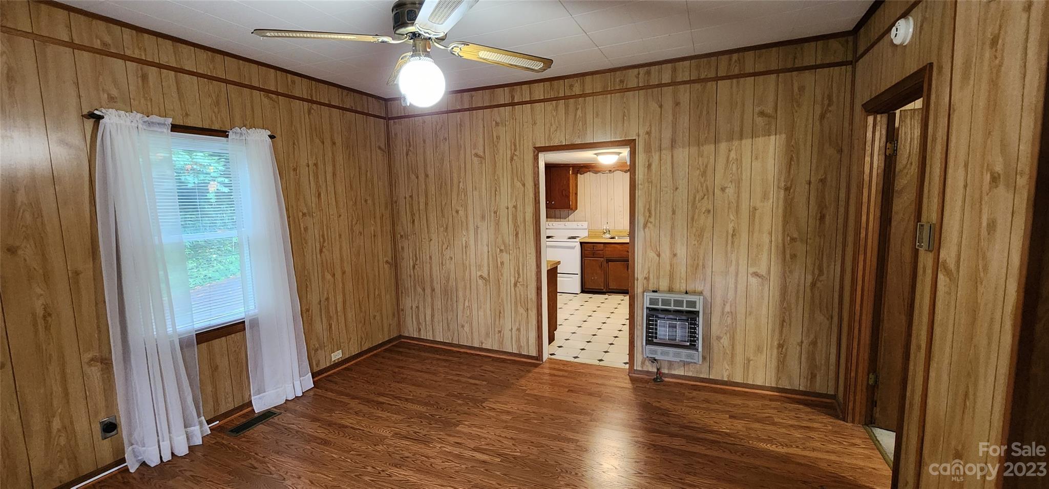 19 Rector Street Tryon, NC 28782 - Photo 25 of 26 a view of empty room with wooden floor