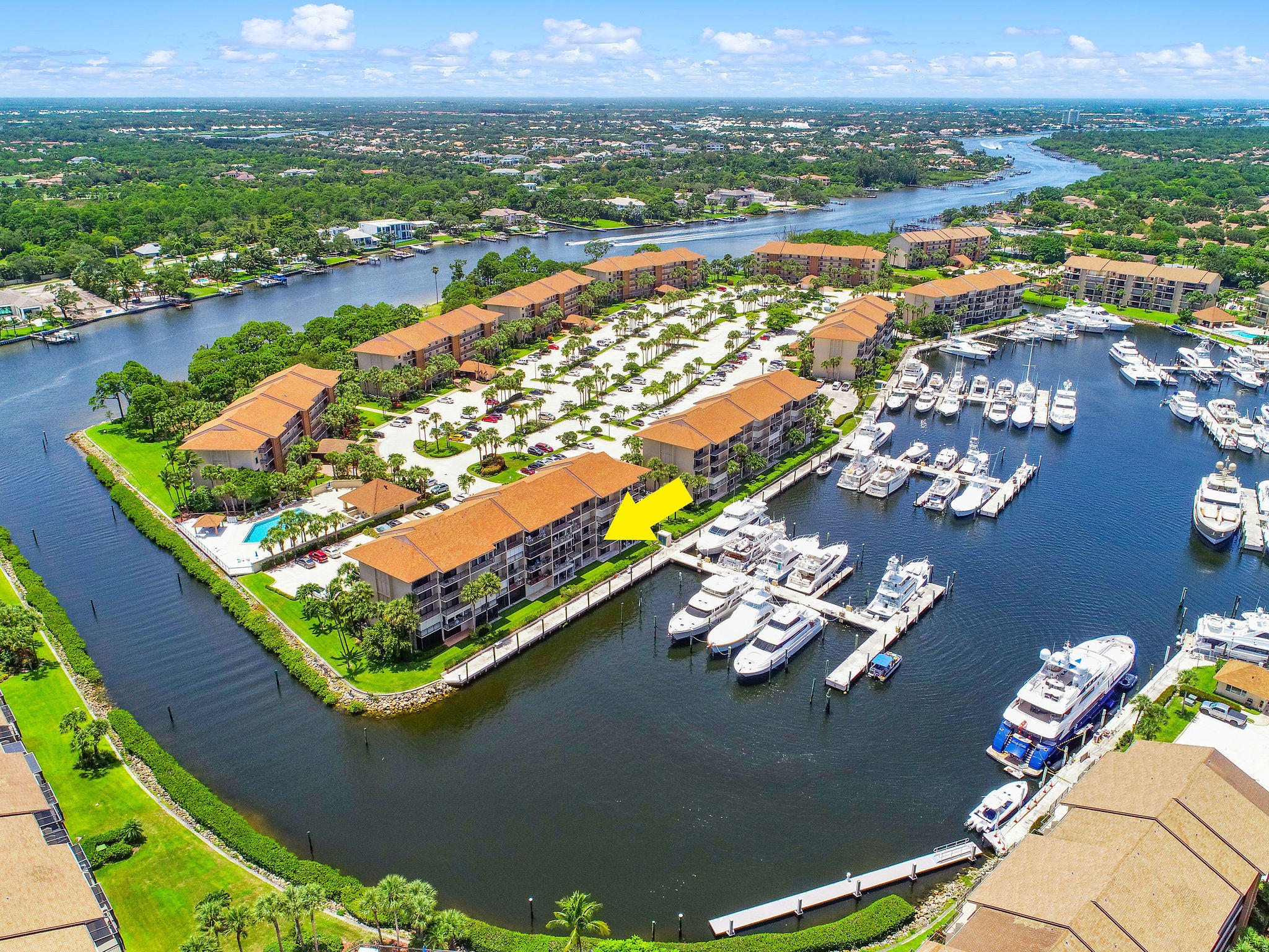 2301 Marina Isle Way, Unit 202 Jupiter, FL 33477 - Photo 1 of 37 2301MarinaIsleWay#202Aerial(5)