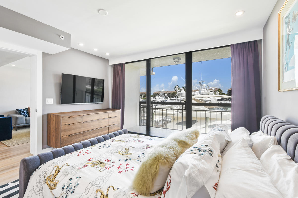 2301 Marina Isle Way, Unit 202 Jupiter, FL 33477 - Photo 15 of 37 Master Bedroom