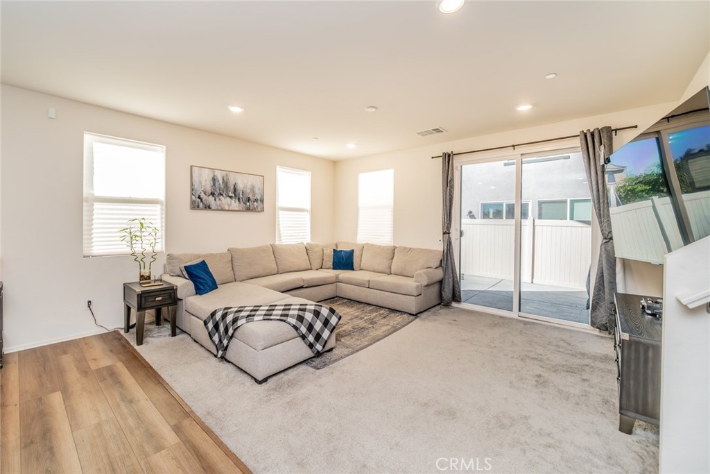 1810 Parkplace Lane Riverside, CA 92501 - Photo 15 of 52 a spacious bedroom with a large bed and a large window