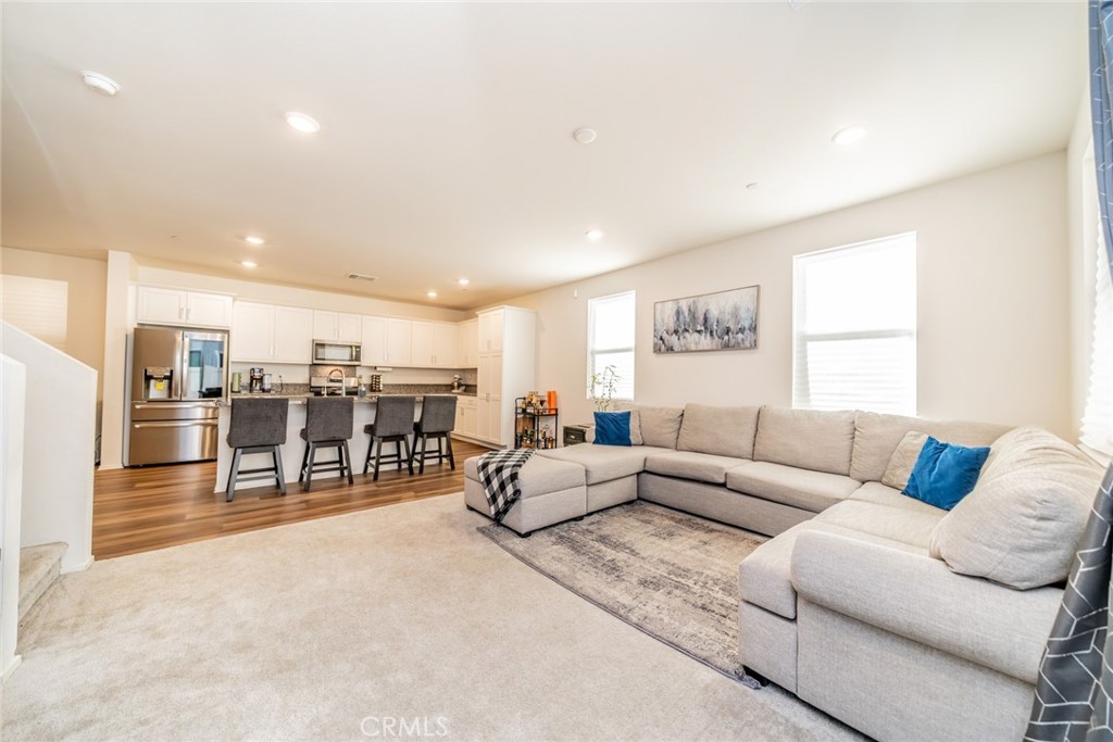1810 Parkplace Lane Riverside, CA 92501 - Photo 16 of 52 a living room with furniture and view of kitchen