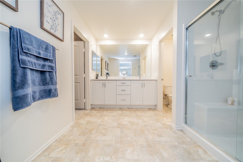 1810 Parkplace Lane Riverside, CA 92501 - Photo 29 of 52 a view of a kitchen cabinets and a refrigerator