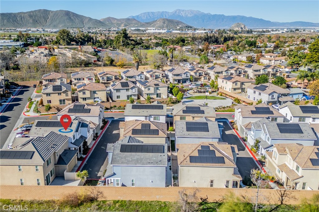 1810 Parkplace Lane Riverside, CA 92501 - Photo 41 of 52 an aerial view of residential houses with outdoor space