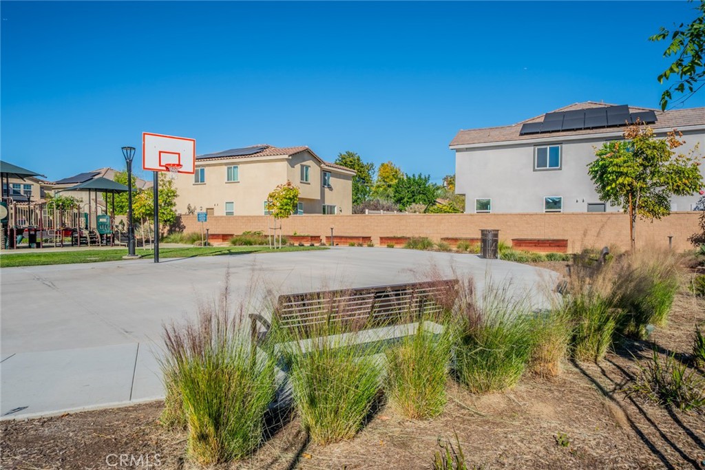 1810 Parkplace Lane Riverside, CA 92501 - Photo 46 of 52 a view of a house with a yard and plants