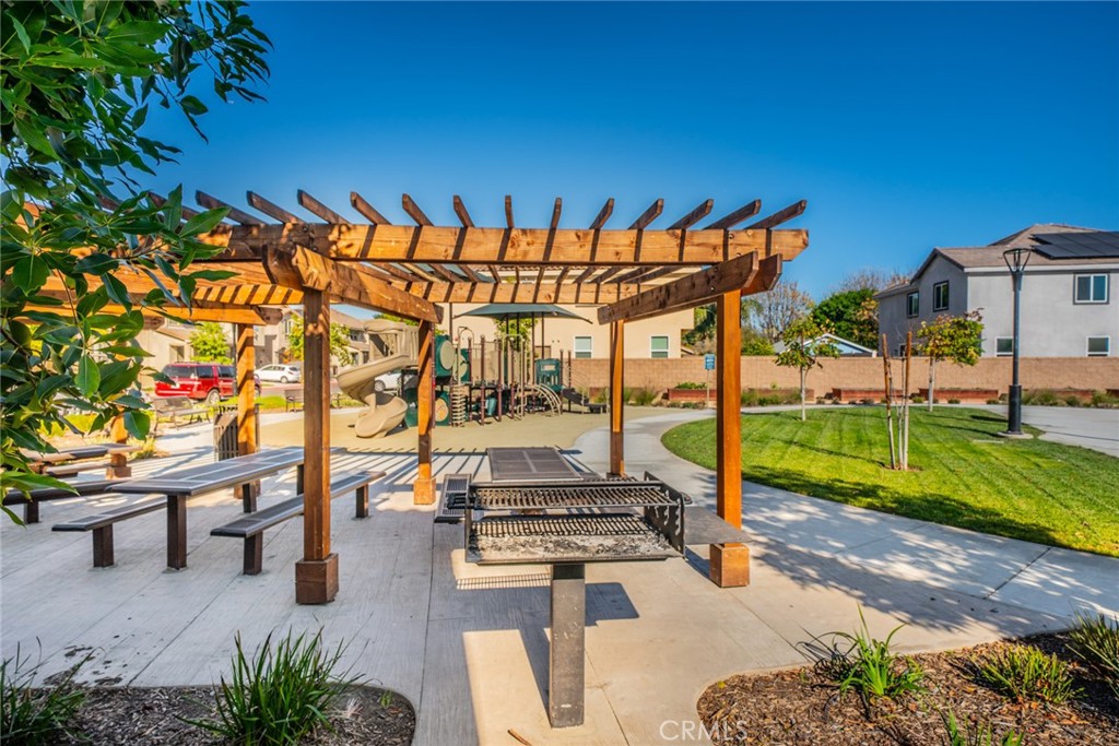 1810 Parkplace Lane Riverside, CA 92501 - Photo 48 of 52 Playground and barbeque area.