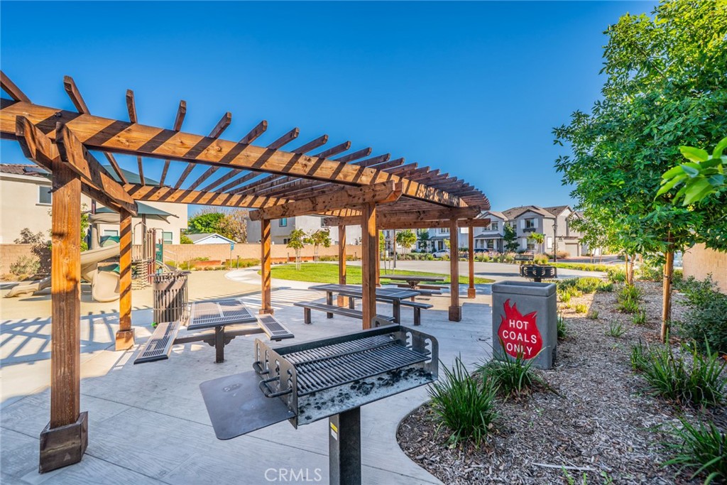 1810 Parkplace Lane Riverside, CA 92501 - Photo 49 of 52 a view of a chairs and table in the patio