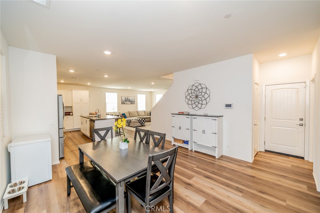 1810 Parkplace Lane Riverside, CA 92501 - Photo 8 of 52 a view of a a dining room with furniture window and wooden floor