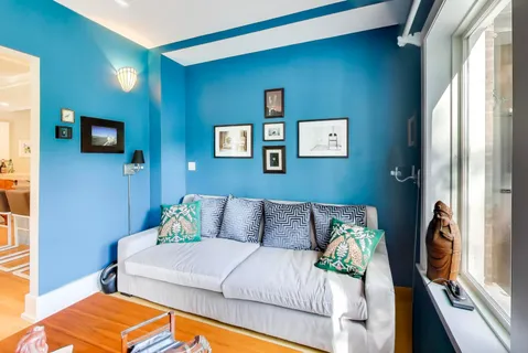 a bathroom with a sink a mirror and a shower