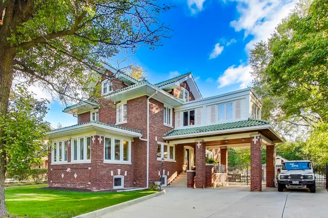 front view of a house with a garden