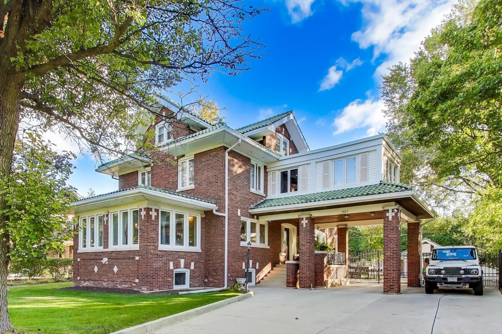 823 Jackson Avenue River Forest, IL 60305 - Photo 2 of 60 front view of a house with a garden