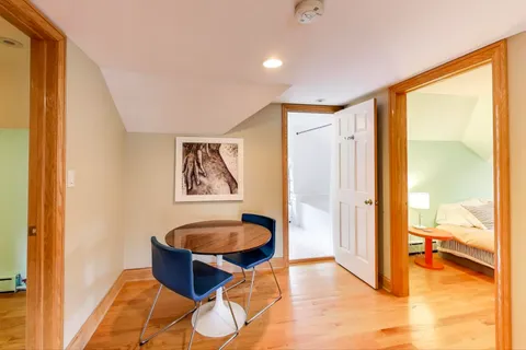 a bathroom with a bathtub and shower