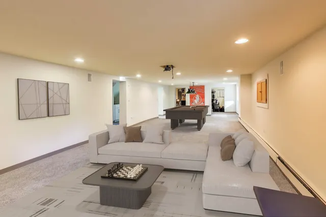 a view of a patio with table and chairs potted plants with wooden fence