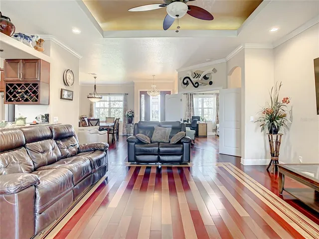 a view of a dining room and kitchen tables