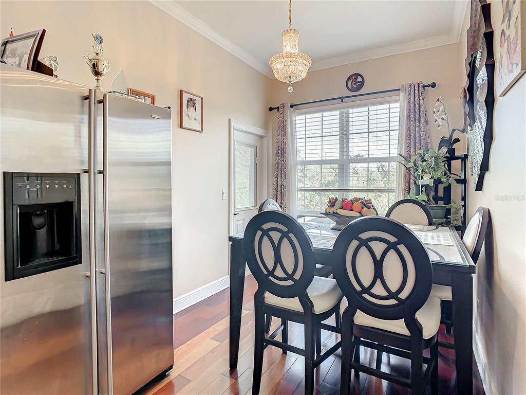 16300 Johns Lake Road Clermont, FL 34711 - Photo 22 of 76 a view of a hallway with furniture and a window