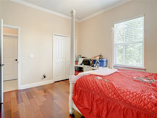 a view of a garden with a building