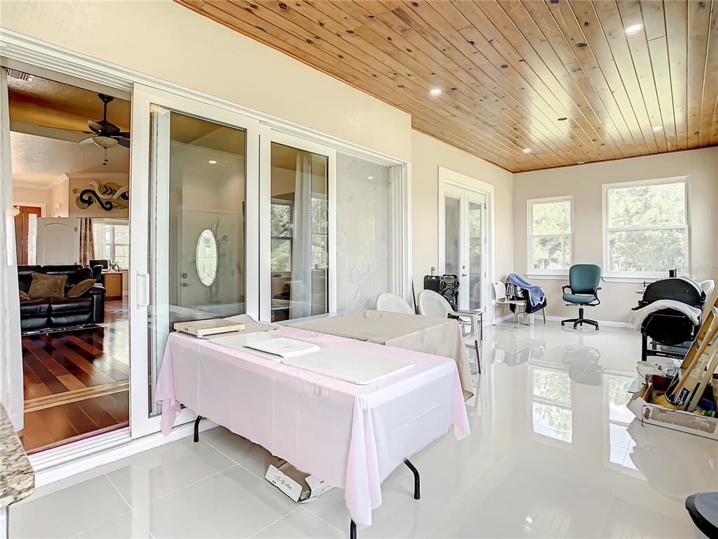 16300 Johns Lake Road Clermont, FL 34711 - Photo 54 of 76 a very nice looking room with a large window and furniture