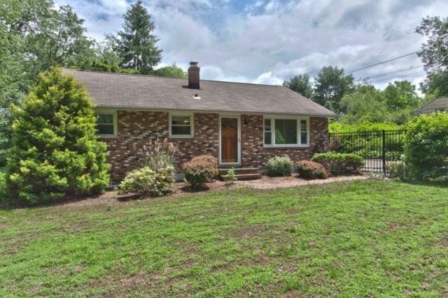 17 Castle Meadow Road Newtown, CT 06470 - Photo 1 of 1 a front view of a house with garden
