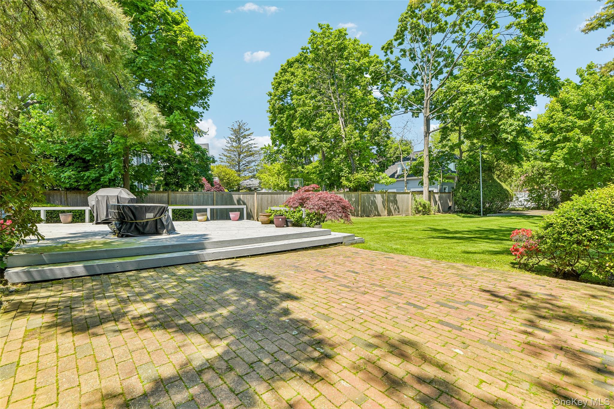 100 Hewlett Neck Road Woodmere, NY 11598 - Photo 39 of 45 a view of a house with pool