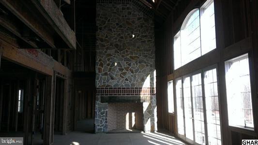 259 Ore Bank Road Dillsburg, PA 17019 - Photo 12 of 29 Inside Great Room - Stone FP - Atrium Doors