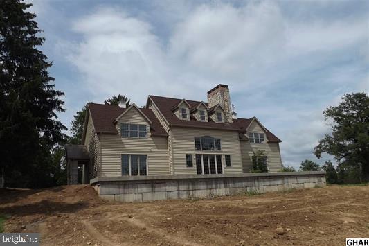 259 Ore Bank Road Dillsburg, PA 17019 - Photo 6 of 29 Back view of the home. Stone Chimney.