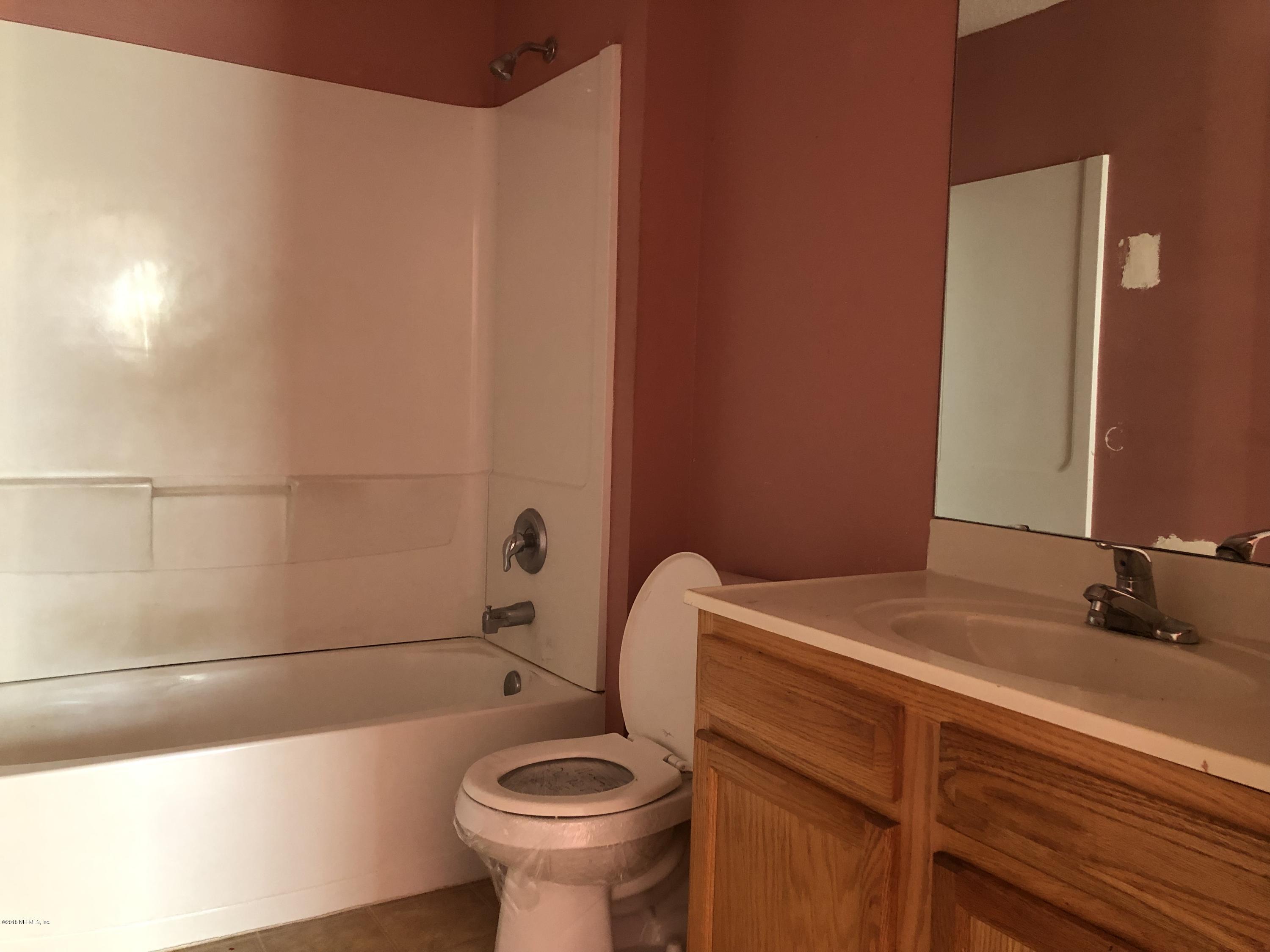 8223 Firetower Road Jacksonville, FL 32210 - Photo 9 of 21 34. MASTER BATHROOM
