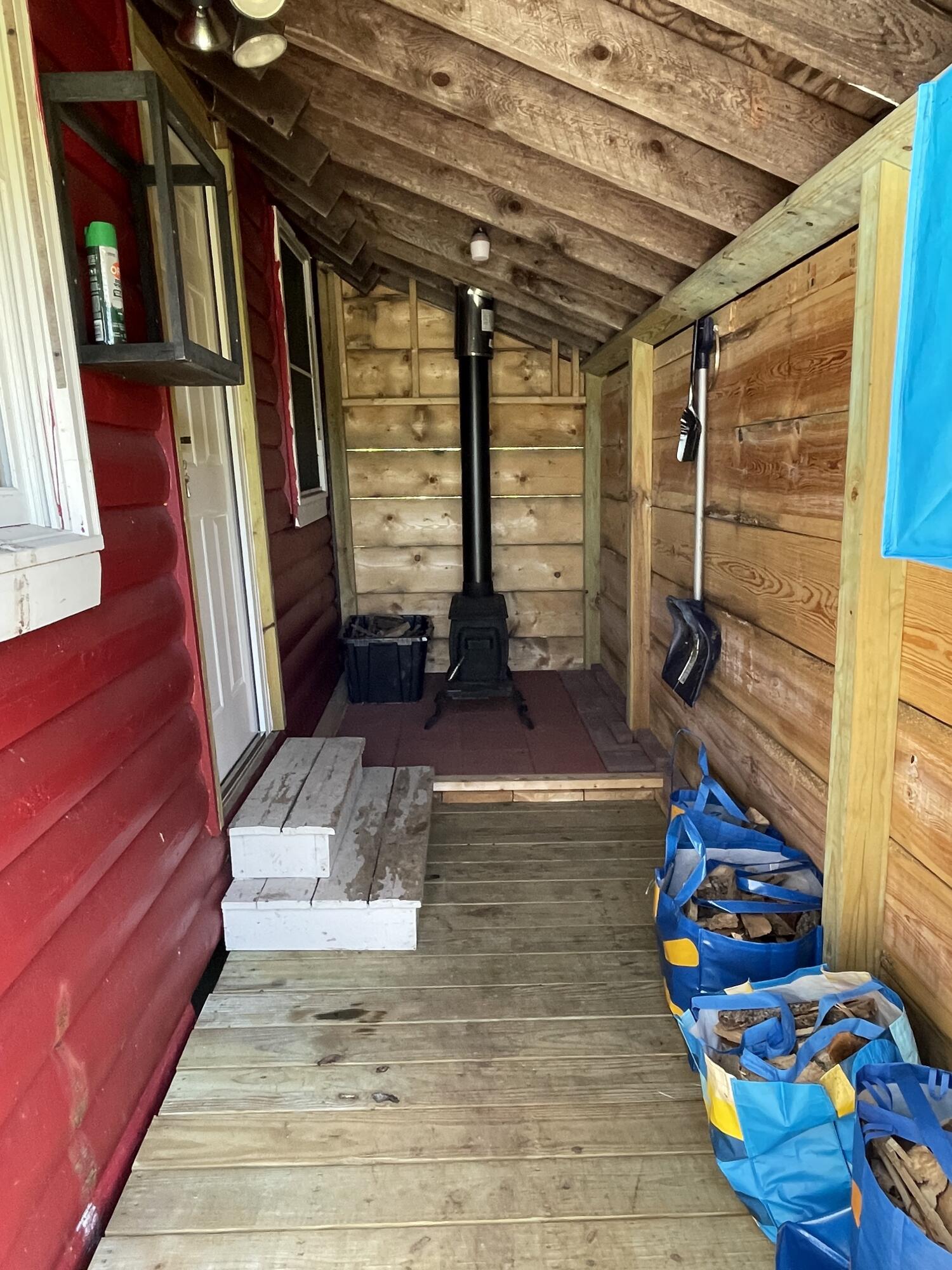 43 Baker Road Burlington, ME 04417 - Photo 11 of 12 Hattabaugh Cabin porch room