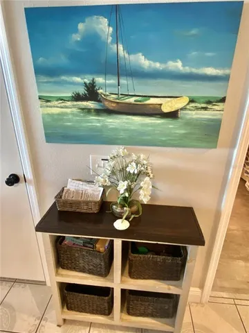 a room with wooden floor and furniture