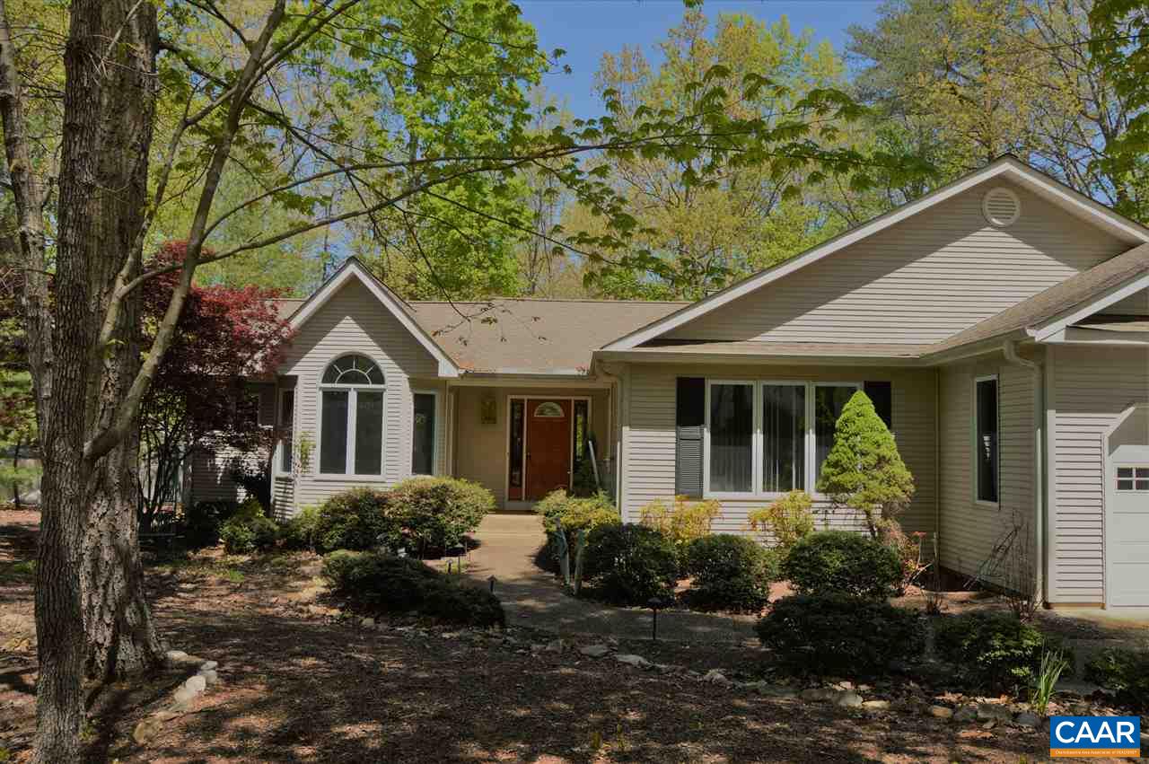 17 Oak Grove Road Palmyra, VA 22963 - Photo 2 of 24 a front view of a house with garden