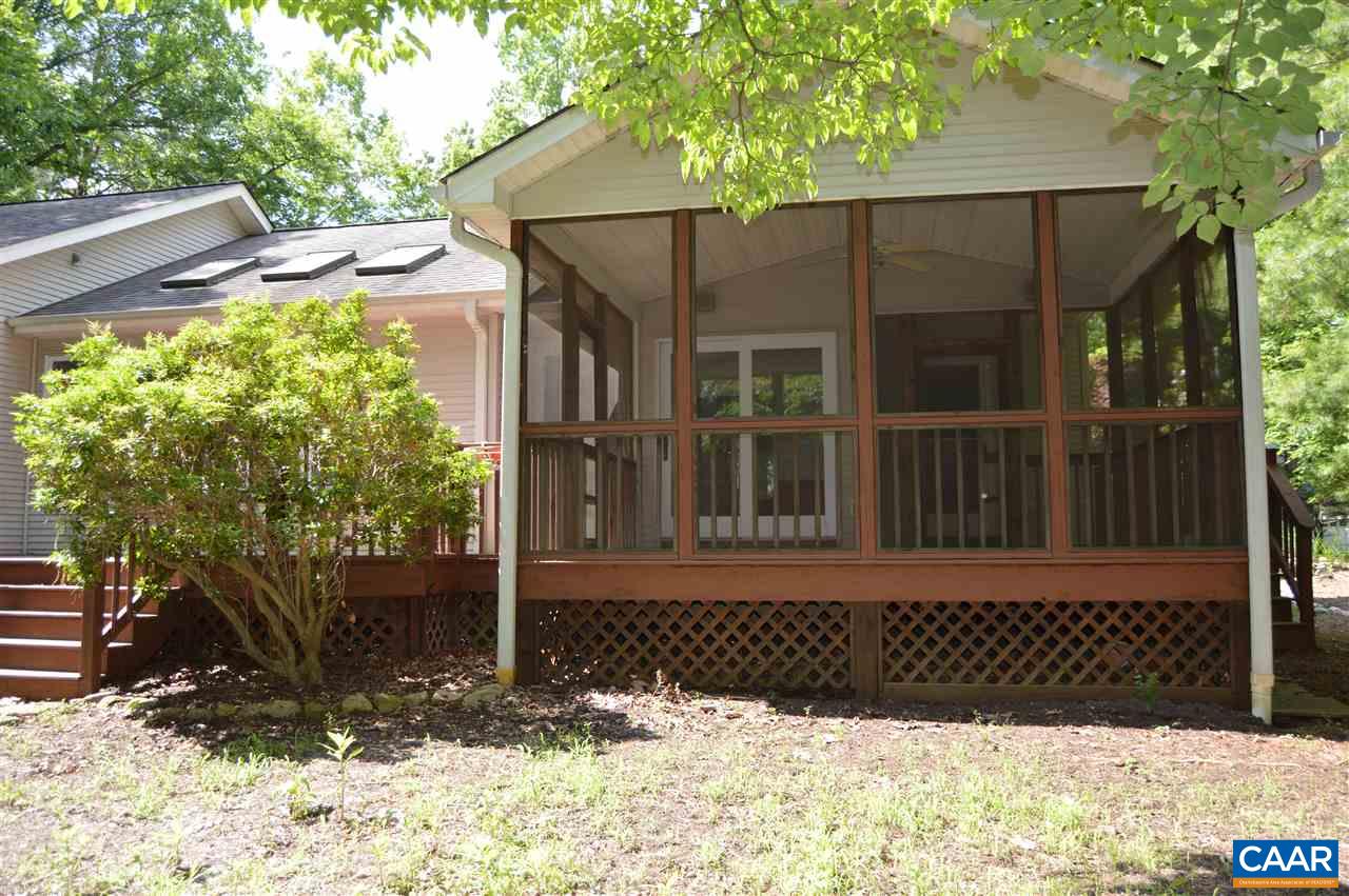17 Oak Grove Road Palmyra, VA 22963 - Photo 22 of 24 a front view of a house with a yard