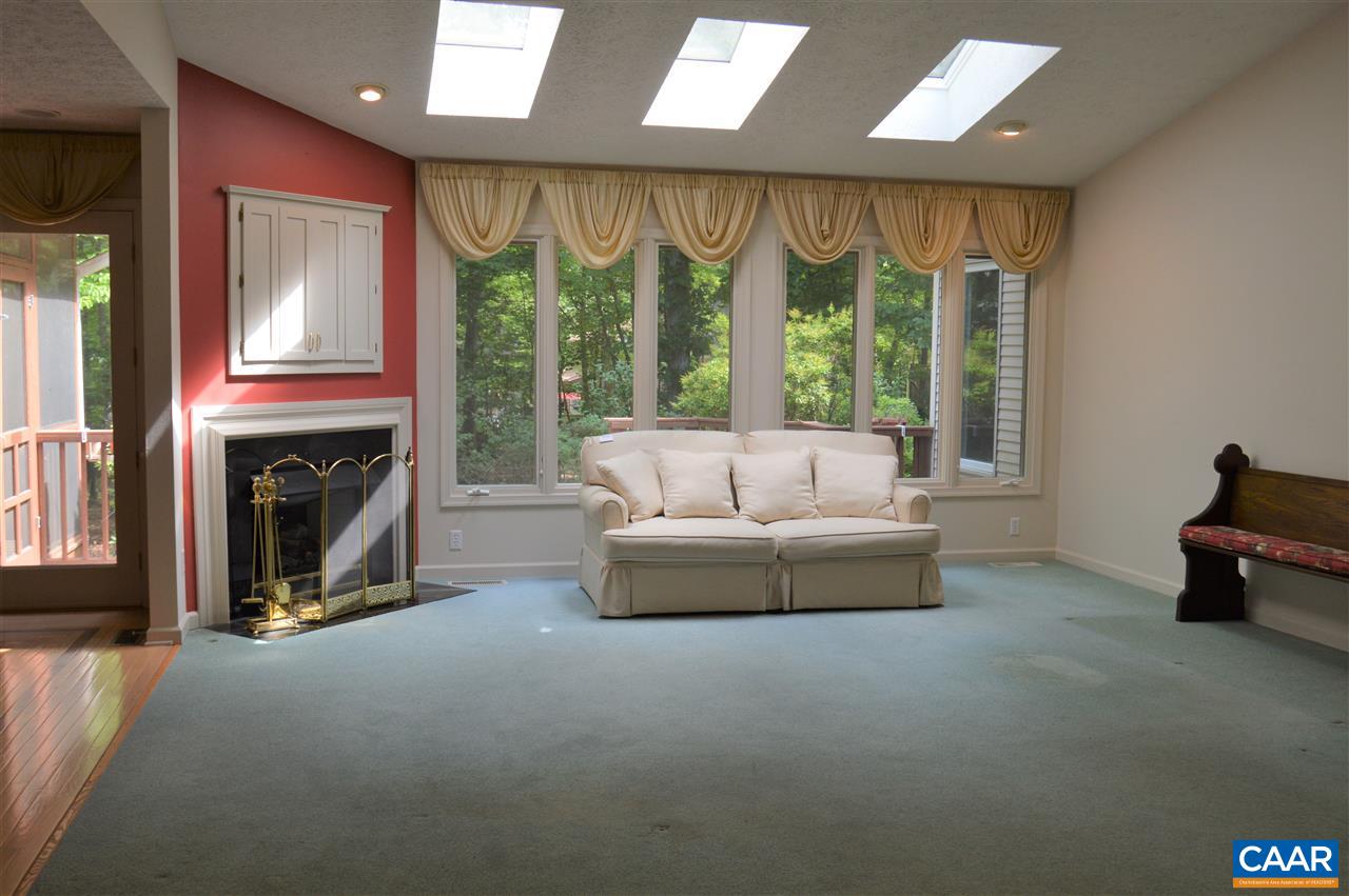 17 Oak Grove Road Palmyra, VA 22963 - Photo 4 of 24 a living room with furniture a fireplace and a large window