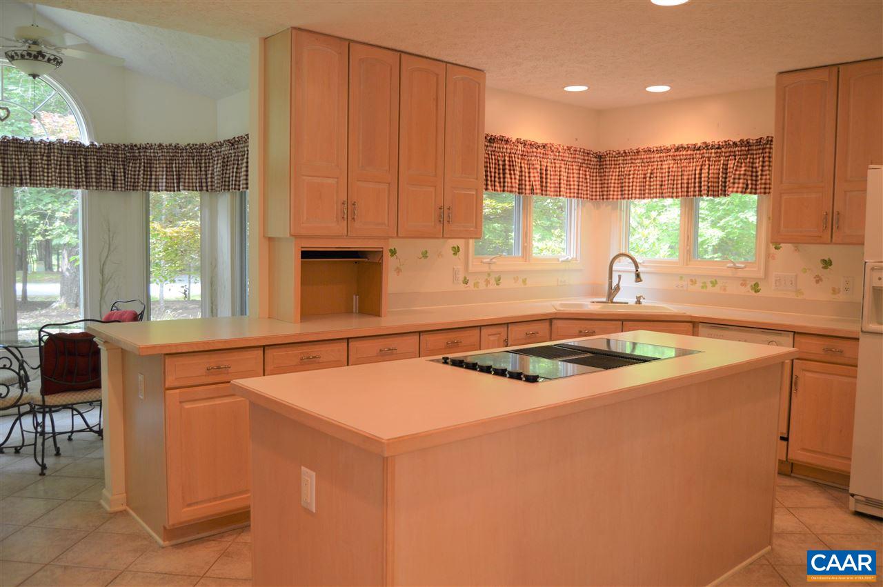 17 Oak Grove Road Palmyra, VA 22963 - Photo 7 of 24 a kitchen with a sink a stove and a refrigerator